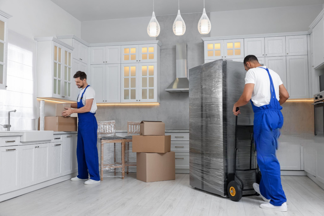 Residential movers packing household items in Los Angeles